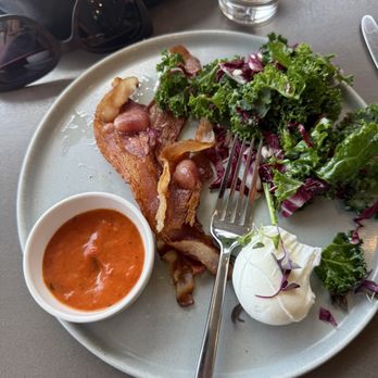 Proud Mary - Kale salad, soft poached egg and crispy bacon - Breakfast & Brunch Near Me - Austin, Texas Proud Mary - Kale salad, soft poached egg and crispy bacon - Breakfast & Brunch Near Me - Austin, Texas
