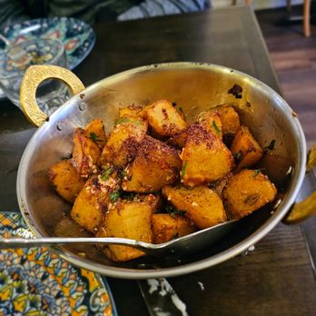Zesty Tabbouleh - Batata Harra- Golden crispy potatoes, harissa, long hots, garlic, lemon & cilantro. $16. Outstanding version/would recommend heavily - Lebanese Near Me - New York, New York Zesty Tabbouleh - Batata Harra- Golden crispy potatoes, harissa, long hots, garlic, lemon & cilantro. $16. Outstanding version/would recommend heavily - Lebanese Near Me - New York, New York