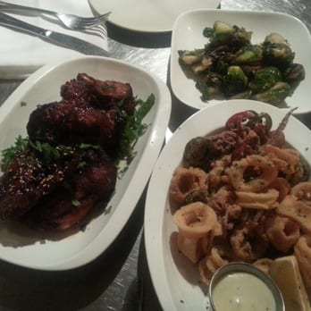 Mua - Chicken wangs. Calamari. Brussel sprouts in brown butter. - Bars Near Me - Oakland, California Mua - Chicken wangs. Calamari. Brussel sprouts in brown butter. - Bars Near Me - Oakland, California