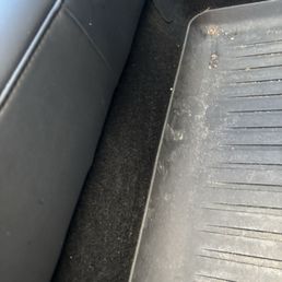 Drivers side back passenger floor.