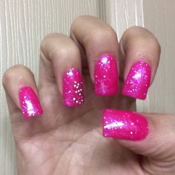 Mystique Tanning Salon - Barbie glitter nails by calli with anchor silver studs - Tanning Near Me - Bakersfield, California