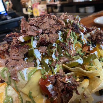 Bobby Q - Mesa - Brisket nachos had these lil tomatoes that where nice . Chips where fresh , over all they where great. - New American Near Me - Mesa, Arizona Bobby Q - Mesa - Brisket nachos had these lil tomatoes that where nice . Chips where fresh , over all they where great. - New American Near Me - Mesa, Arizona