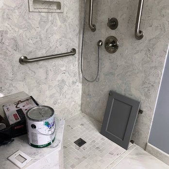 Triangle Remodeling Service - Wooden cabinet door in shower? I'm sure it's not supposed to go there..... Clean up? Not this guy! - General Contractors Near Me - Chapel Hill, North Carolina