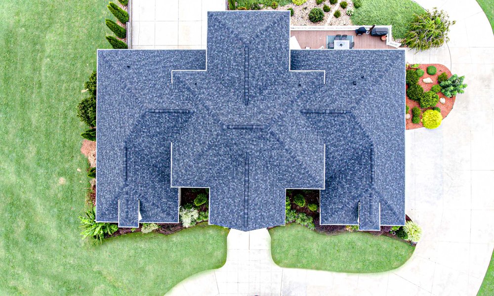 Slide of Guy Roofing