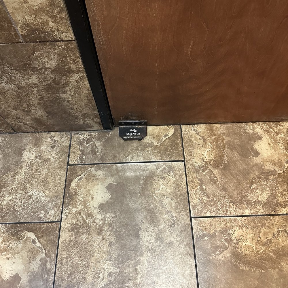 A shoe pull so you don't have to touch a dirty handle leaving the restroom.