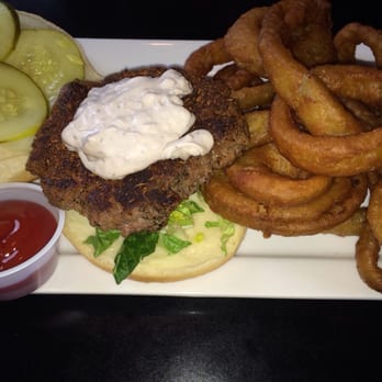Oakley Pub and Grill - The black and blue burger with onion rings. - Burgers Near Me - Cincinnati, Ohio Oakley Pub and Grill - The black and blue burger with onion rings. - Burgers Near Me - Cincinnati, Ohio