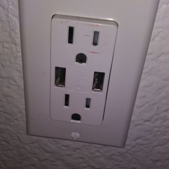 Motel 6 - Wall outlet where it happened. That red stuff is where my purse melted to the outlet!!!! My purse was about 3 inches from the outlet. - Hotels Near Me - Moreno Valley, California Motel 6 - Wall outlet where it happened. That red stuff is where my purse melted to the outlet!!!! My purse was about 3 inches from the outlet. - Hotels Near Me - Moreno Valley, California