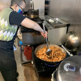 Chu Minh Tofu and Vegan Deli - Owner making more lemongrass chili tofu. - Vietnamese Near Me - Seattle, Washington