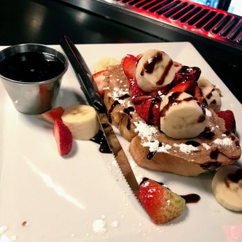 Julians - Single piece of french toast - New American Near Me - Providence, Rhode Island Julians - Single piece of french toast - New American Near Me - Providence, Rhode Island