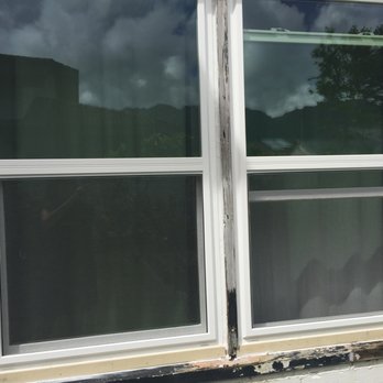 Blue Star Design And Builders - Here are my new windows installed into rotted frames.  This is what they considered a finished job. - General Contractors Near Me - Honolulu, Hawaii