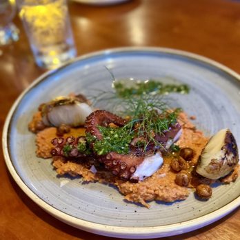 Guild Tavern - a plate of food on a table - Steakhouses Near Me - South Burlington, Vermont