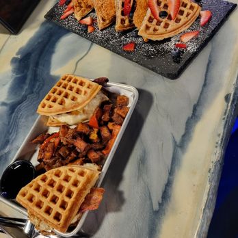 All American Sports Bar - Breakfast sandwich sliders with sweet potato home fries and chicken & waffles - Sports Bars Near Me - Springfield, Massachusetts All American Sports Bar - Breakfast sandwich sliders with sweet potato home fries and chicken & waffles - Sports Bars Near Me - Springfield, Massachusetts