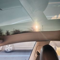 On the Spot Automotive Detailing - Light coming through the tint on the roof.