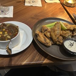 1501 Kitchen & Bar - Beef and vegetable soup and dry rub wings both dishes
