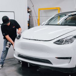 SG Window Tint - Chase installing a clear bra package on a Tesla.
