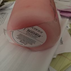 Yankee Candle Company - Bottom of broken candles delivered in boxes with cardboard inserts.