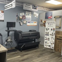 Postal Hub & More - Large format Print area for banners, yard signs, posters, canvas and much more