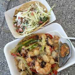 Mariscos La Reyna del Sur 3 - Fish taco and mixed seafood taco. (I picked the red onions off my fish taco, will asked them not to add next time if possible).