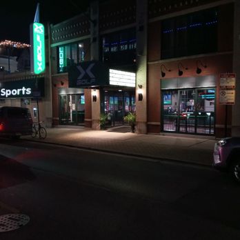 X Golf - a night time view of a sports store - Sports Bars Near Me - Chicago, Illinois