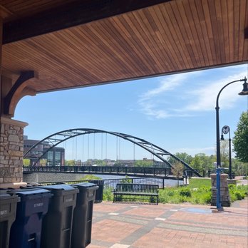 Phoenix Park - a view of a bridge over a river - Farmers Market Near Me - Eau Claire, Wisconsin