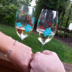 Sharlene Monroe-RE/MAX Town Center - Celebrating our new place with the glasses Sharlene gave us. We use them once a year ever since!