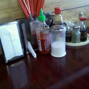 Asian Cafe - side condiments on every table - Thai Near Me - Sacramento, California
