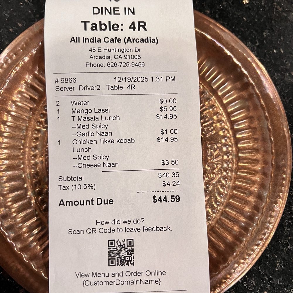 All India Cafe - Our receipt for two lunch specials, cheese naan, garlic naan and a mango lassi - Indian Near Me - Arcadia, California All India Cafe - Our receipt for two lunch specials, cheese naan, garlic naan and a mango lassi - Indian Near Me - Arcadia, California