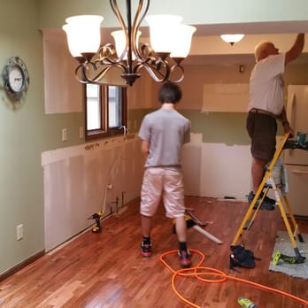 911 Handyman - two men working on a light fixture - General Contractors Near Me 911 Handyman - two men working on a light fixture - General Contractors Near Me