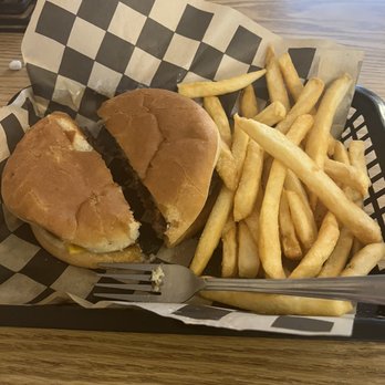 Taste of Caddo - Burger basket. Burger is very thick and good size. Had a great flavor and I couldn't finish it. - Steakhouses Near Me - Jefferson, Texas