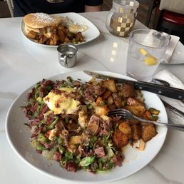 Best Corn Beef Hash and Eggs... I couldn't wait and ate one of the poached eggs before this picture! Yum.