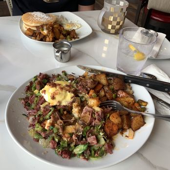 Toast Coffeehouse - Best Corn Beef Hash and Eggs... I couldn't wait and ate one of the poached eggs before this picture! Yum. - Coffee & Tea Near Me - Patchogue, New York