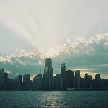 MNM Professionals - a view of a city from the water - Stucco Services Near Me