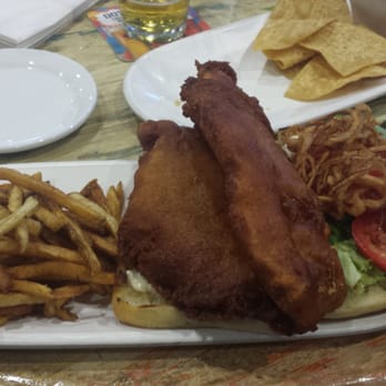Stingrays Taphouse - Small fish sandwich - Sports Bars Near Me - Port Aransas, Texas Stingrays Taphouse - Small fish sandwich - Sports Bars Near Me - Port Aransas, Texas