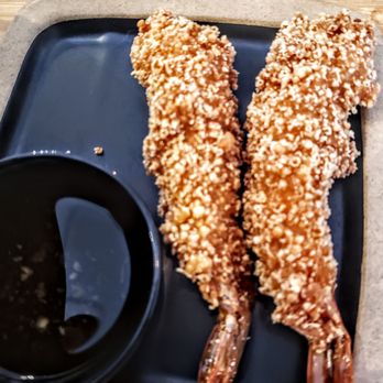 Motea - two pieces of fried fish on a plate with a dipping sauce - Bubble Tea Near Me - Schererville, Indiana Motea - two pieces of fried fish on a plate with a dipping sauce - Bubble Tea Near Me - Schererville, Indiana