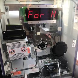 Busy and most ticket machines don't work or are taking tickets and not disbursing winnings.