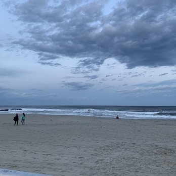 BISTRO AVON - two people walking on the beach - New American Near Me - Avon-by-the-Sea, New Jersey BISTRO AVON - two people walking on the beach - New American Near Me - Avon-by-the-Sea, New Jersey