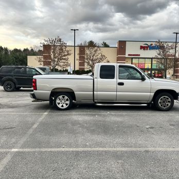 Dos Amigos Burritos - a silver truck in a parking lot - Mexican Near Me - Concord, New Hampshire