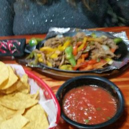 Chips and their house made salsa, very similar to El Rancho up in Gaylord. And these are the beef fajitas my wife ordered.