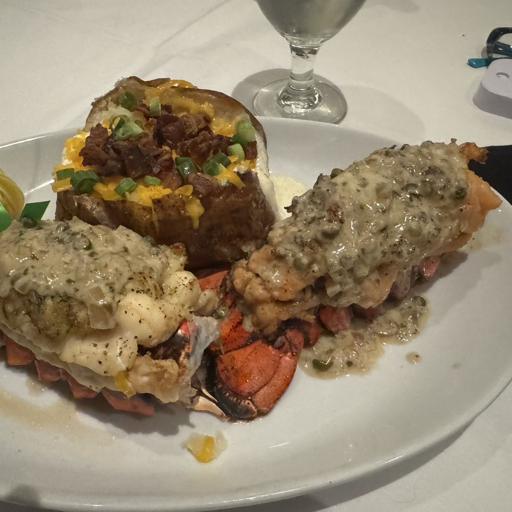 Steve Fields - Twin stuffed Lobster with loaded baked potato - Steakhouses Near Me - Plano, Texas Steve Fields - Twin stuffed Lobster with loaded baked potato - Steakhouses Near Me - Plano, Texas