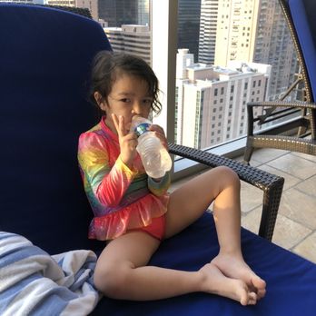 Hilton Americas - Drinks by the pool - Hotels Near Me - Houston, Texas
