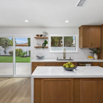 Stacy Lawrence Realtor - Waterfall kitchen island with Quartz countertops. - Real Estate Agents Near Me - San Clemente, California Stacy Lawrence Realtor - Waterfall kitchen island with Quartz countertops. - Real Estate Agents Near Me - San Clemente, California