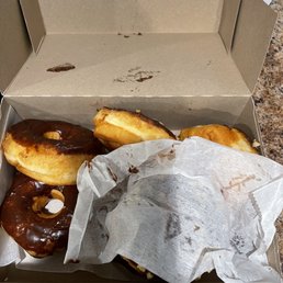 No care in putting simple donuts in a box No care in putting simple donuts in a box