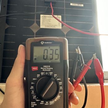 Ronnie's Electronics - A "mythical non-existent" multimeter reading amperage off a DC solar panel. - Car Stereo Installation Near Me - National City, California Ronnie's Electronics - A "mythical non-existent" multimeter reading amperage off a DC solar panel. - Car Stereo Installation Near Me - National City, California