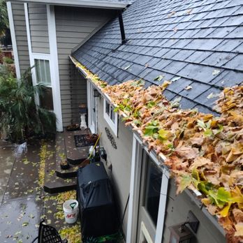 Top Down Gutter & Windows - Clogged gutter in the middle of a rain storm - Gutter Services Near Me Top Down Gutter & Windows - Clogged gutter in the middle of a rain storm - Gutter Services Near Me
