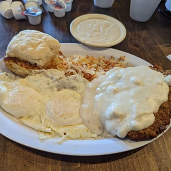 Teskey's General Store & Grill - Chicken fried steak, two eggs over medium, hash browns and homemade biscuit and gravy. - American Near Me - Weatherford, Texas Teskey's General Store & Grill - Chicken fried steak, two eggs over medium, hash browns and homemade biscuit and gravy. - American Near Me - Weatherford, Texas