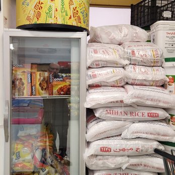 Casa Blanca Market - Some, of many, large bags of rice. Plus a bit of frozen foodstuffs to go with it. - Specialty Food Near Me - Albuquerque, New Mexico