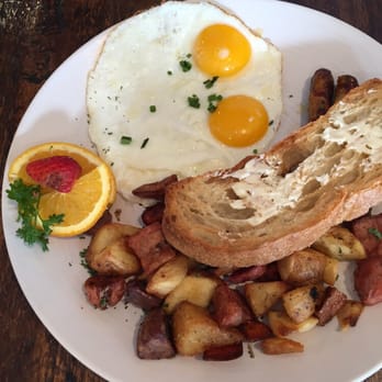 Kitchen Sunnyside - Sunnyside up eggs with chicken curry sausage and potato medley - Breakfast & Brunch Near Me - Mill Valley, California Kitchen Sunnyside - Sunnyside up eggs with chicken curry sausage and potato medley - Breakfast & Brunch Near Me - Mill Valley, California