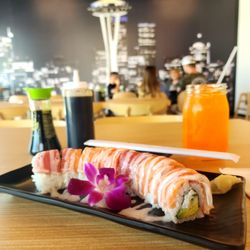 206 Luster Grill - Aloha Roll 
(California Roll with Salmon, Tuna & Crab Meat on top with White Sauce)