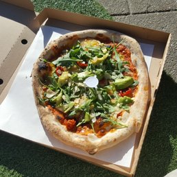 Vegan pizza with avo, cauliflower, arugula, violife, lemon, and hazelnut sauce. Amazing! Vegan pizza with avo, cauliflower, arugula, violife, lemon, and hazelnut sauce. Amazing!