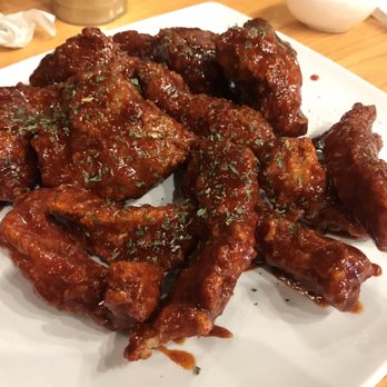 Noori Chicken - Korean Fried Chicken (Drumsticks & Strips) with hot sauce. - Chicken Wings Near Me - Grand Rapids, Michigan Noori Chicken - Korean Fried Chicken (Drumsticks & Strips) with hot sauce. - Chicken Wings Near Me - Grand Rapids, Michigan